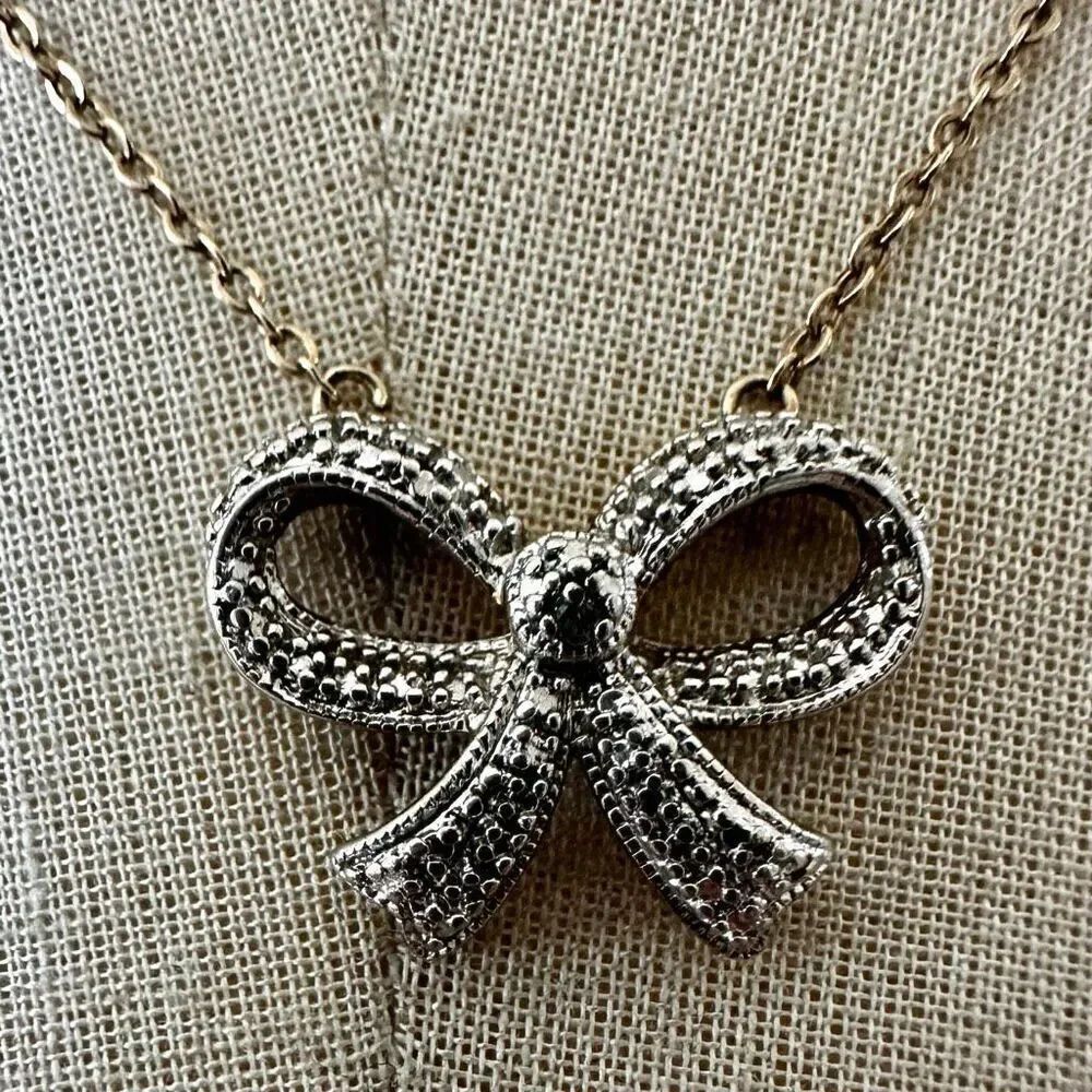 PAJ Silver and gold Tone Textured Bow Pendant Necklace
